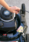 Removing the dipstick from a lawnmower engine